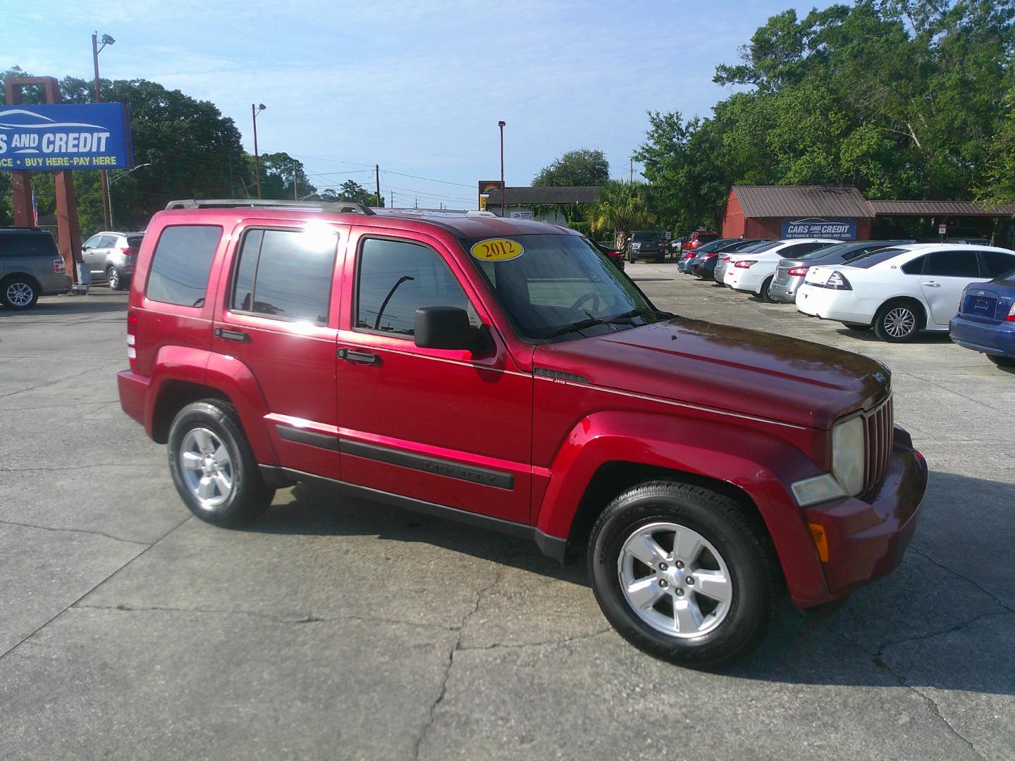 2012 RED JEEP LIBERTY SPORT (1C4PJLAK7CW) , located at 1200 Cassat Avenue, Jacksonville, FL, 32205, (904) 695-1885, 30.302404, -81.731033 - Photo#2